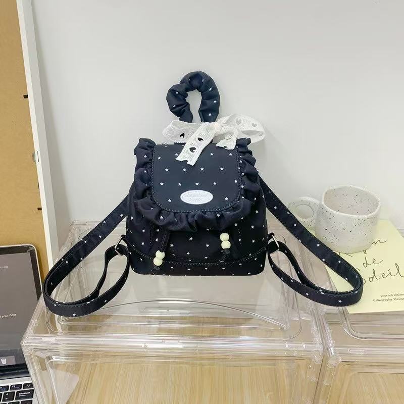 Small backpack with plaid flap